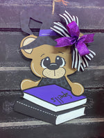 SPELL BOOK BEAR PAINTED DOOR HANGER